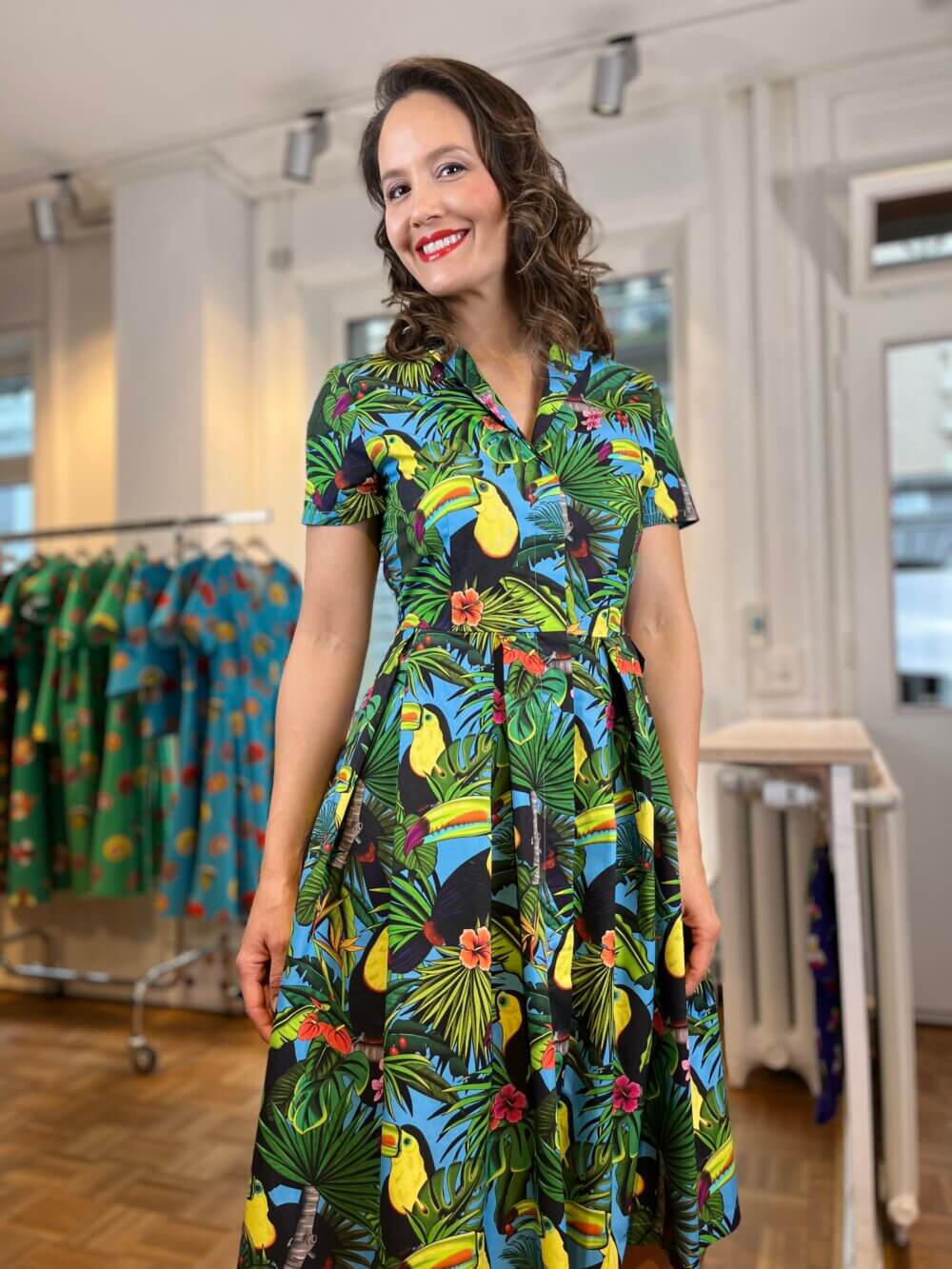 Toucans- Dress with inverted pleats